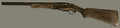 Golden Double-Barrel Shotgun.